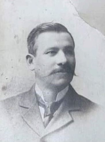 Photo of Dr. Colin Crusor; Black and White